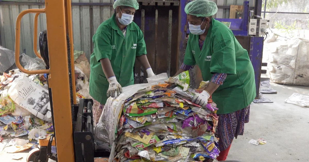 CleanHub volunteers compiling recyclable plastics.